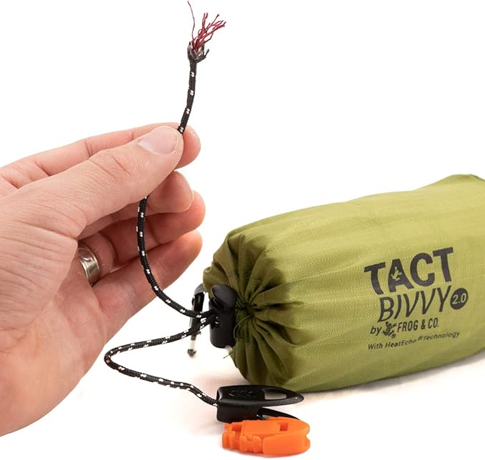 Survival Frog Tact Bivvy 2.0 Emergency Sleeping Bag w/Stuff Sack, Carabiner, Survival Whistle, ParaTinder - Compact, Lightweight, Waterproof, Reusable, Thermal Bivy Sack Cover, Shelter Kit