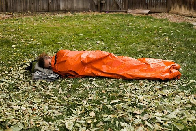 Survival Frog Tact Bivvy 2.0 Emergency Sleeping Bag w/Stuff Sack, Carabiner, Survival Whistle, ParaTinder - Compact, Lightweight, Waterproof, Reusable, Thermal Bivy Sack Cover, Shelter Kit