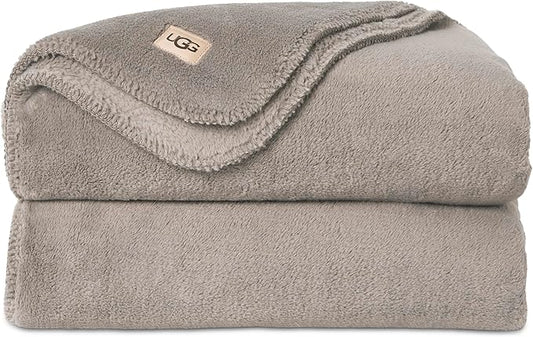 UGG Whitecap Plush Throw Blanket Fleece Lightweight Soft Throw for Couch or Bed Luxury Home Decor for Living Room Washable Hypoallergenic Blankets for Dorm Decor, 50-inch x 70-inch, Light Grey Seal