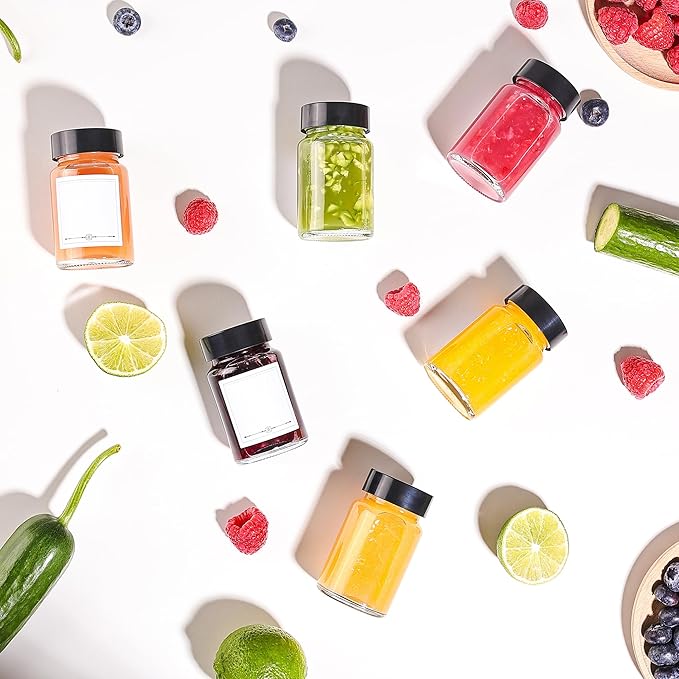 16 Pack 2 oz Glass Shot Bottles with Black Lids & Labels, Wide Mouth 60 ml Small Glass Bottles for Ginger, Leakproof Travel Mini Clear Jars for Wellness Shot, Juice - Dishwasher Safe