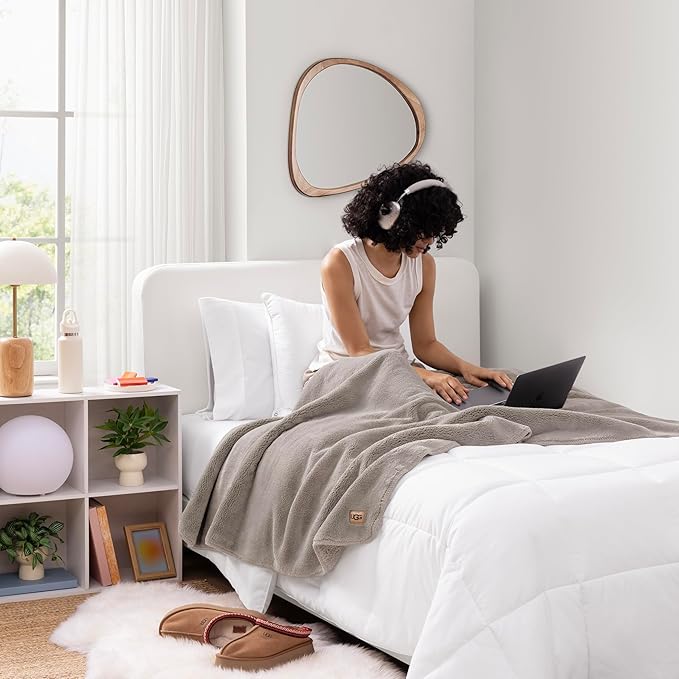 UGG Whitecap Plush Throw Blanket Fleece Lightweight Soft Throw for Couch or Bed Luxury Home Decor for Living Room Washable Hypoallergenic Blankets for Dorm Decor, 50-inch x 70-inch, Light Grey Seal